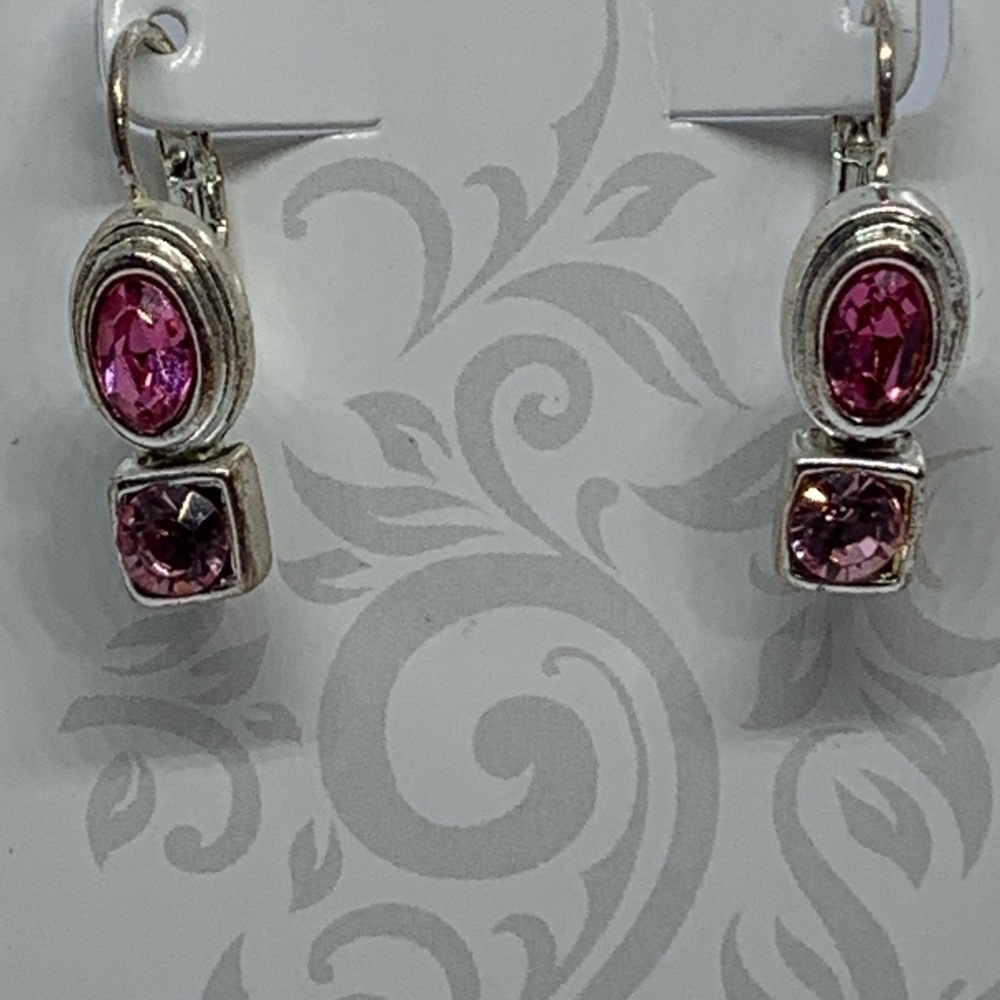 Two pink crystals silver tone lever back earring